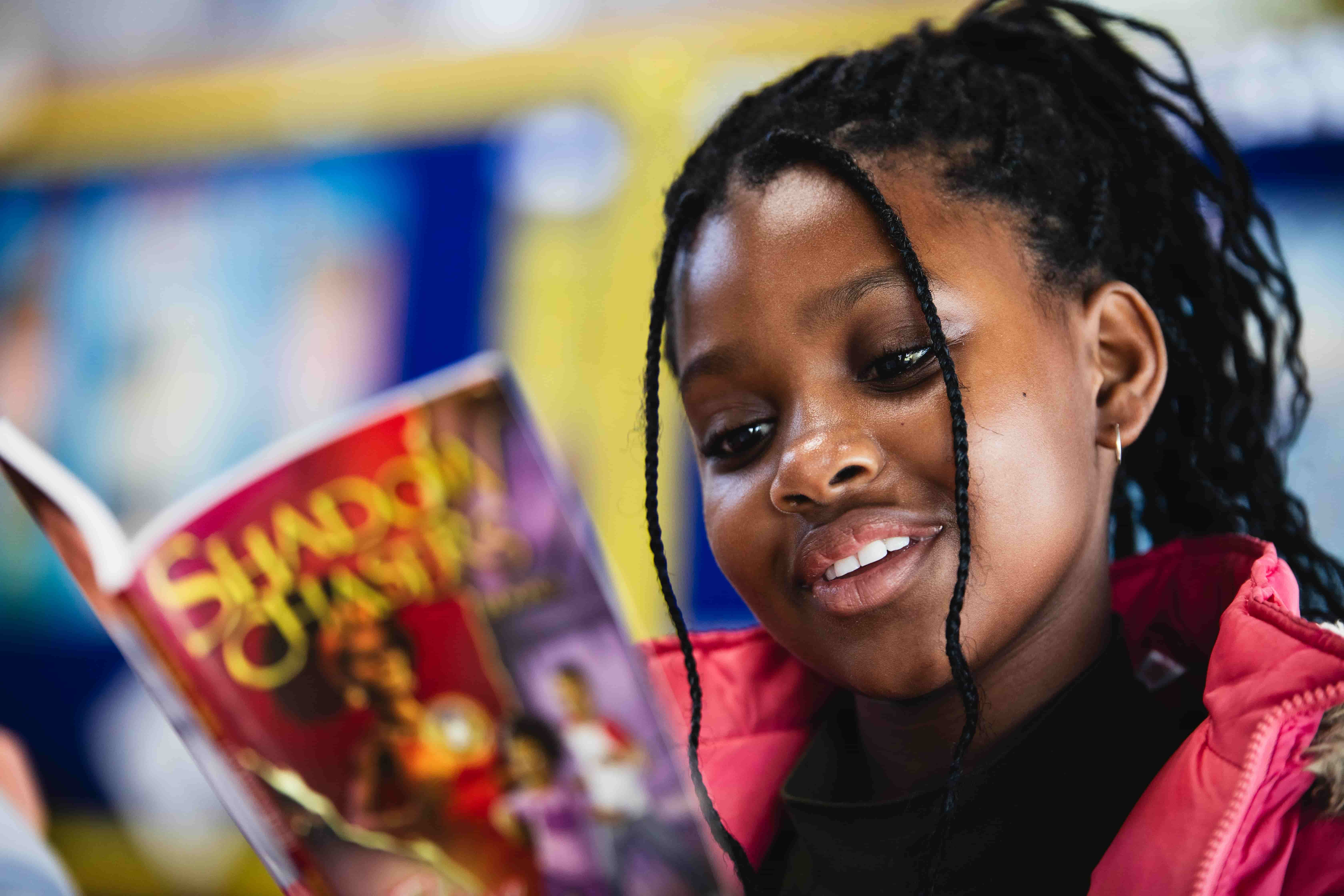 A young reader enjoying a book